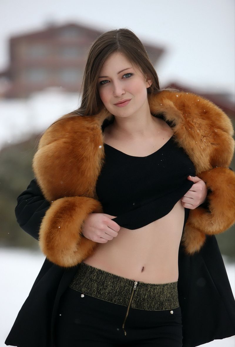 brunette girl in the black winter coat