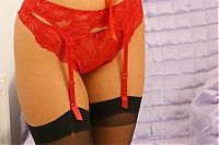 Nake.Me search results: blonde girl wearing red underwear and black stockings