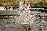 Nake.Me search results: young strawberry blonde girl strips her bikini at the river