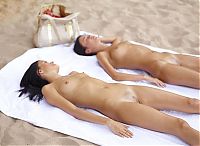 Nake.Me search results: two young girls sunbathing on the beach