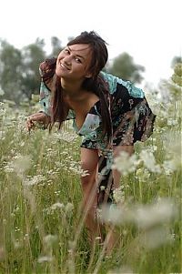 Nake.Me search results: young brunette girl in a meadow