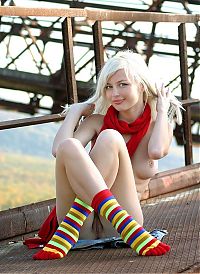 Babes: young blonde girl wearing rainbow socks