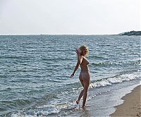 Babes: blonde girl posing in the sea