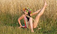 Nake.Me search results: young brunette girl with a flower wreath on the wheat field