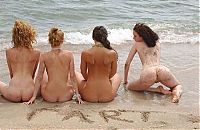 Nake.Me search results: four young girls relaxing on the beach