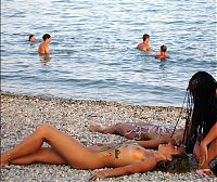 Babes: naked girl naturists on a nude beach