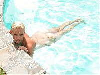 Nake.Me search results: young blonde girl relaxing outside in the backyard at the swimming pool