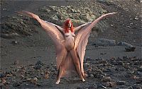 Nake.Me search results: young red haired girl with butterfly wings on rocky mountains
