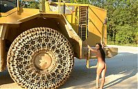Nake.Me search results: young black haired girl posing with heavy construction equipment vehicles of various types