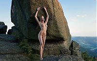 Nake.Me search results: cute young blonde girl with a navel piercing posing naked on rocks in high mountains